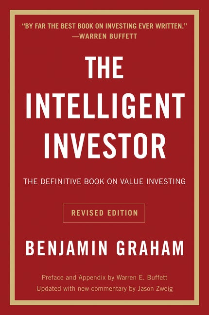 Item #333780 The Intelligent Investor Rev Ed. (Collins Business Essentials). Benjamin Graham,...