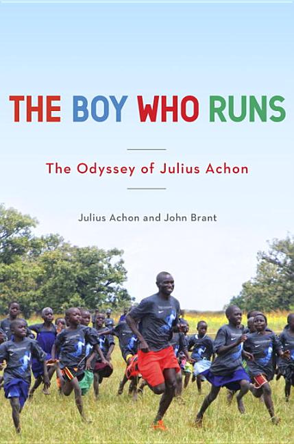 Item #235503 The Boy Who Runs: The Odyssey of Julius Achon. John Brant