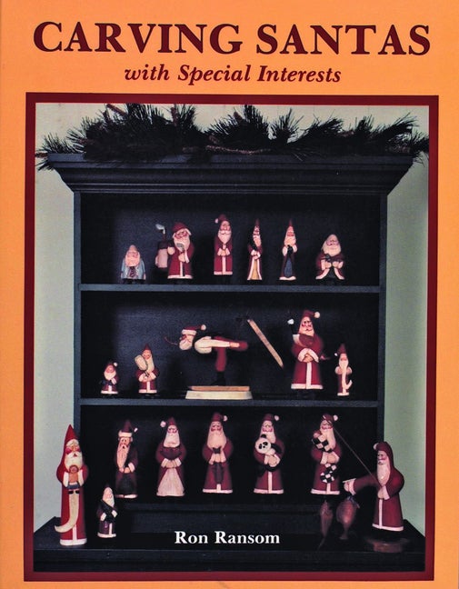 Item #97801 Carving Santas With Special Interests. Ron Ransom